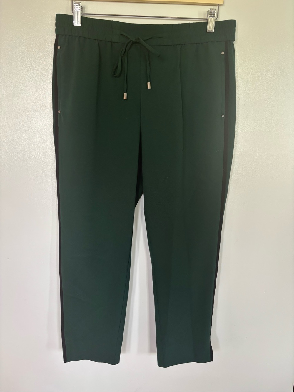 Flirtatious dark green with black strip trousers